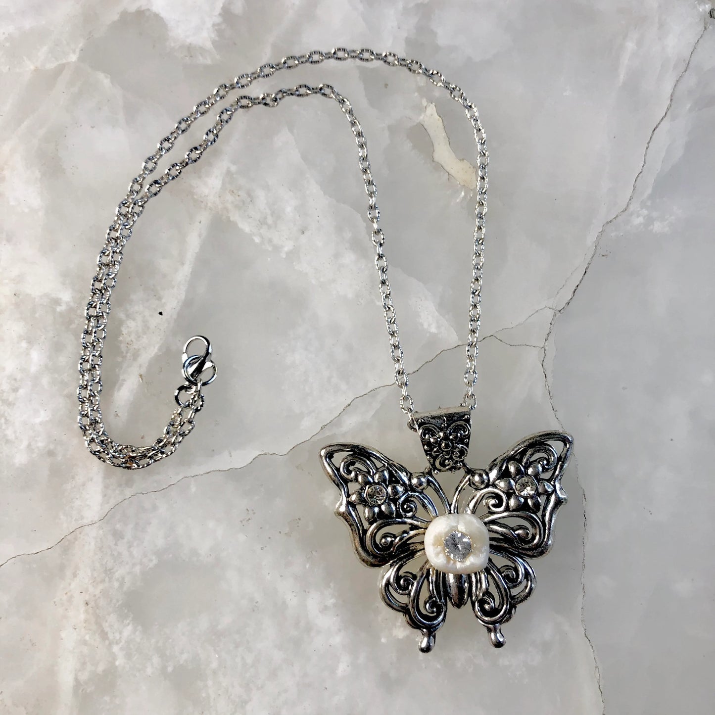 Silver Butterfly Molar Necklace